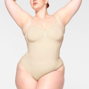 SKIMS Seamless Sculpt Brief Bodysuit in Sand - L/XL